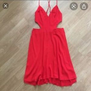 Red dress with cut outs on side